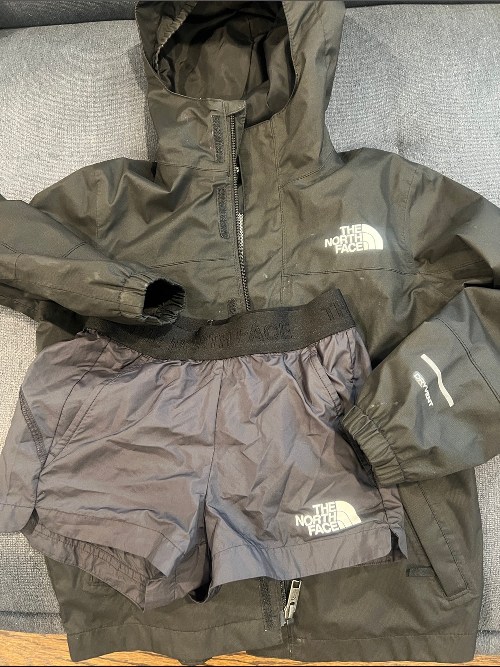 The North Face Black Hooded Jacket with Black Running Shorts